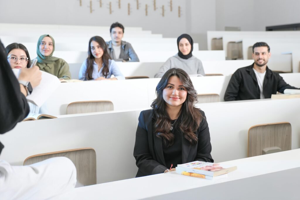 Diverse university students sitting in lecture hall representing AI grading and assessment in higher education 2026.
